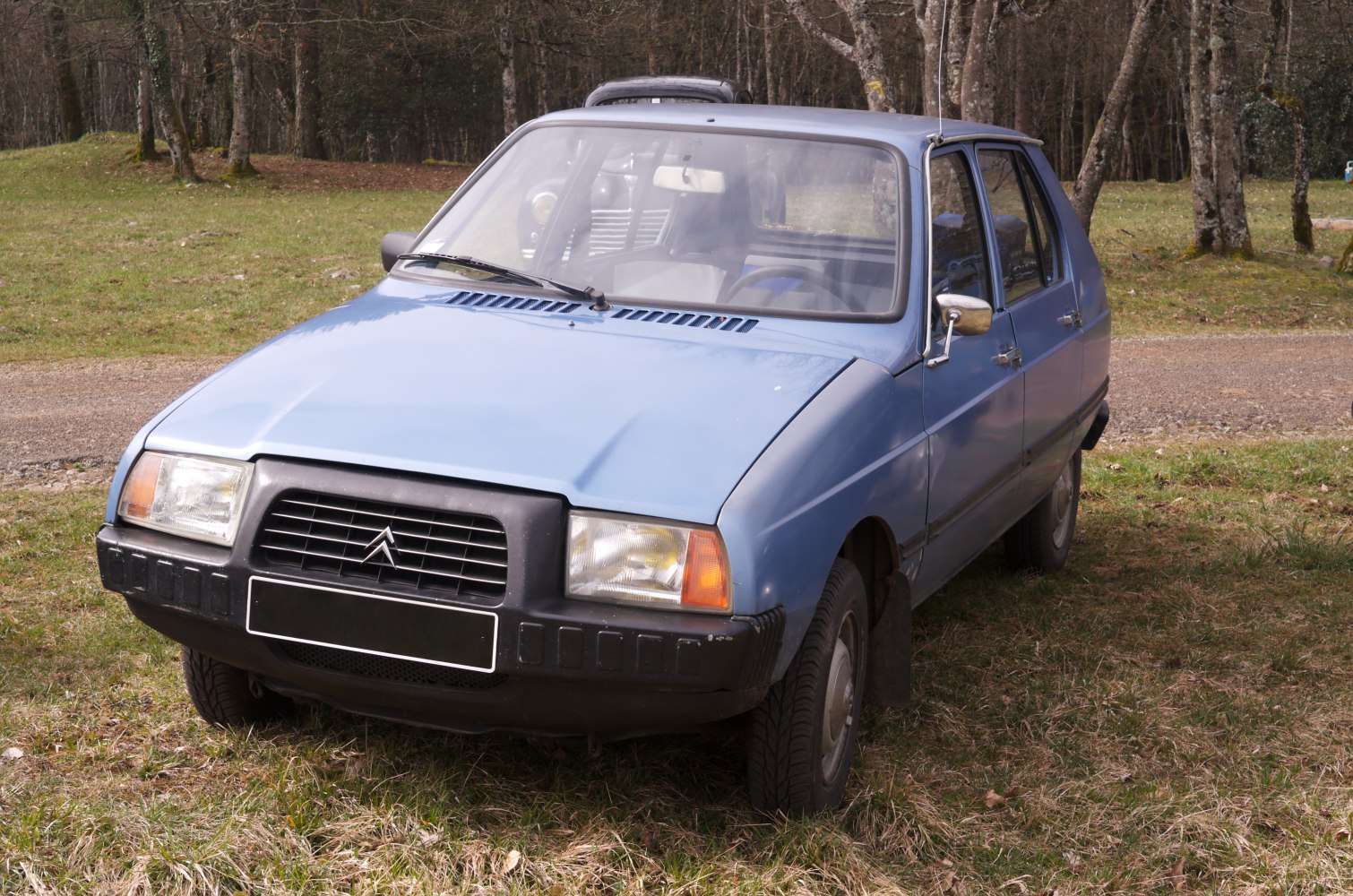 Classic vintage hatchback with rectangular headlights and sturdy front bumper