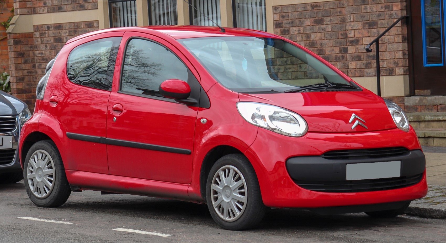 Compact 5-door hatchback with rounded front design and black trim details
