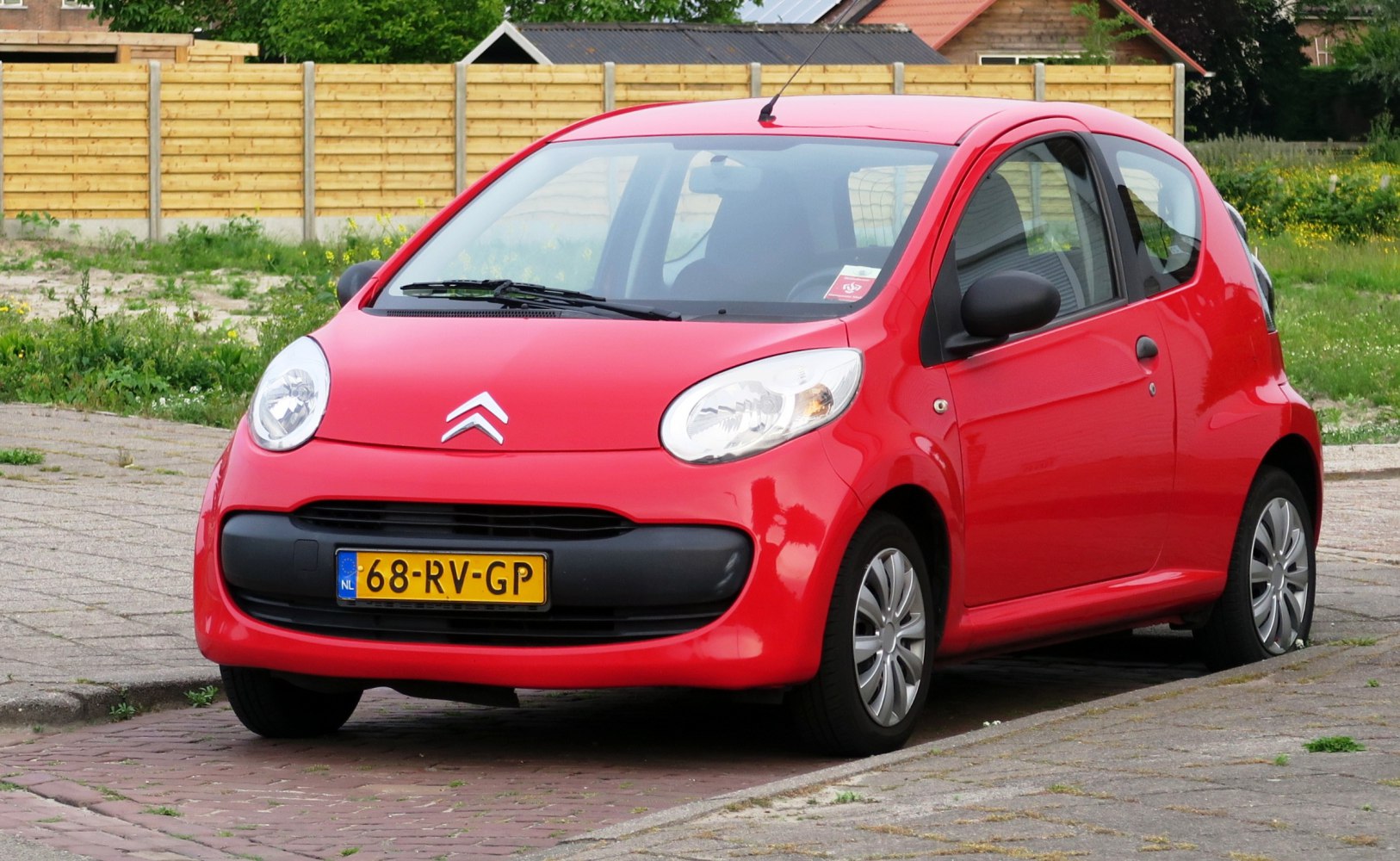 3-door urban hatchback with round headlights and compact design