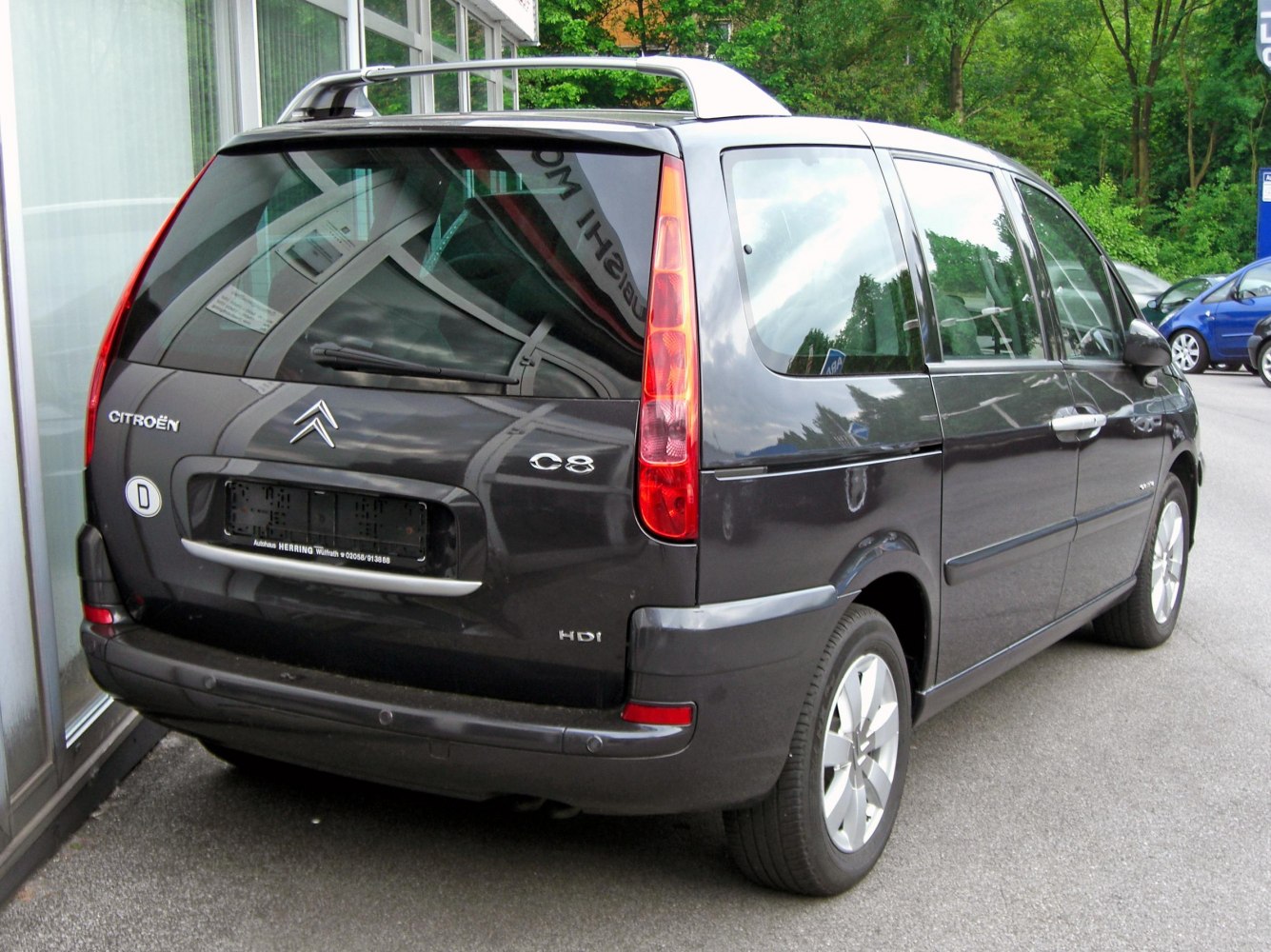 Rear view with vertical tail lights and rear wiper on MPV