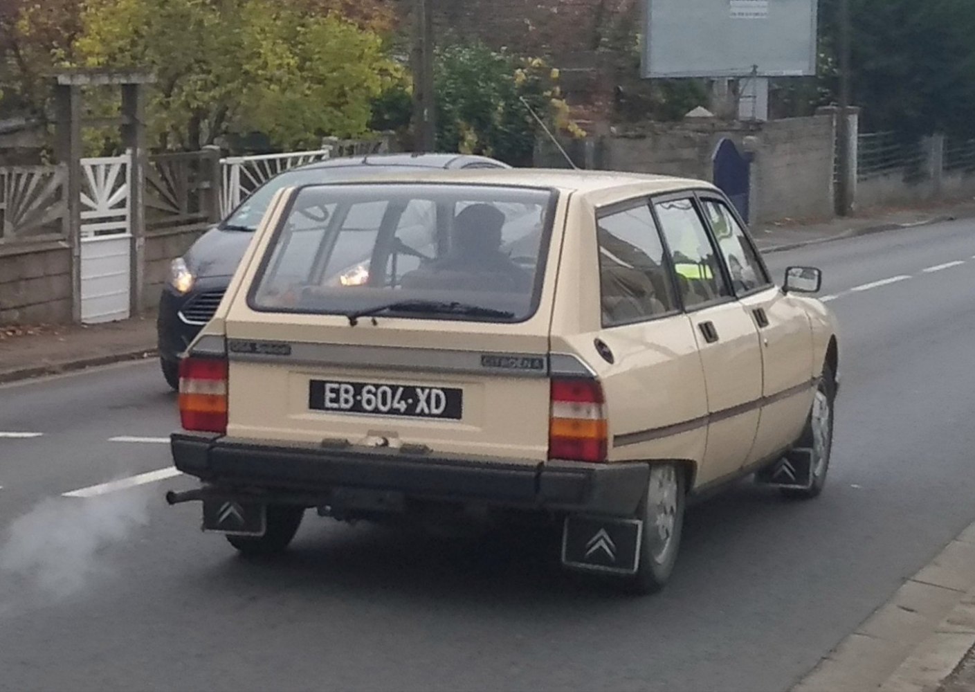 Rear view of classic hatchback wagon with taillights and rectangular design