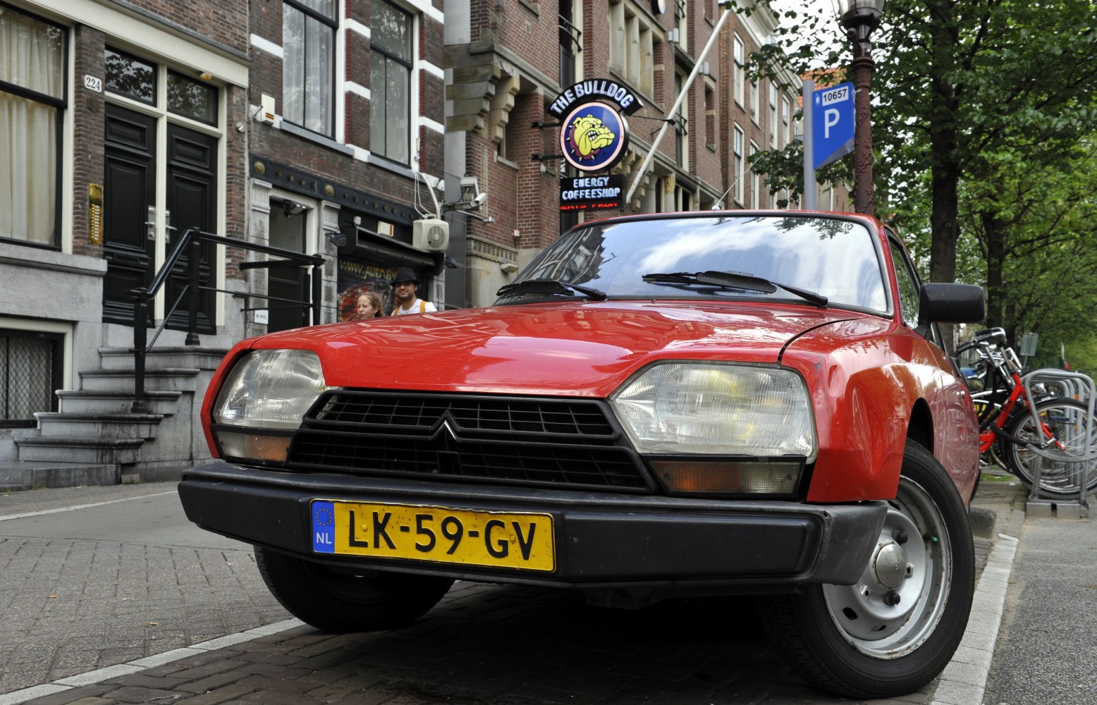 Front view of classic car with angular headlights and vintage design