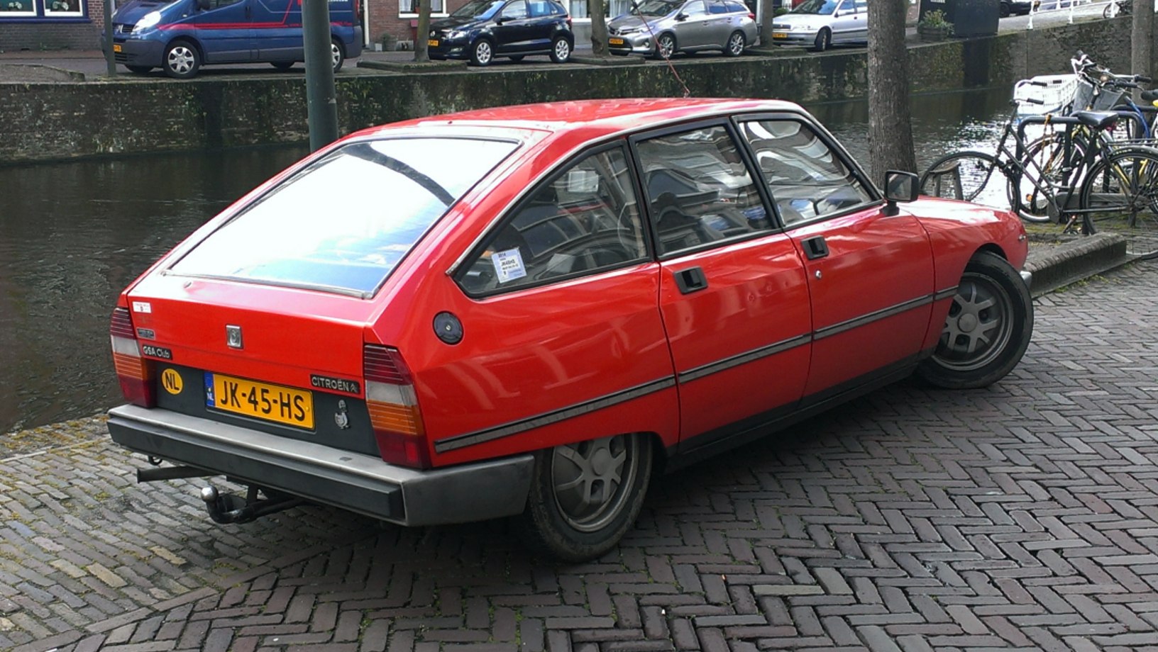 Angular rear hatchback with large rear window and unique wheels