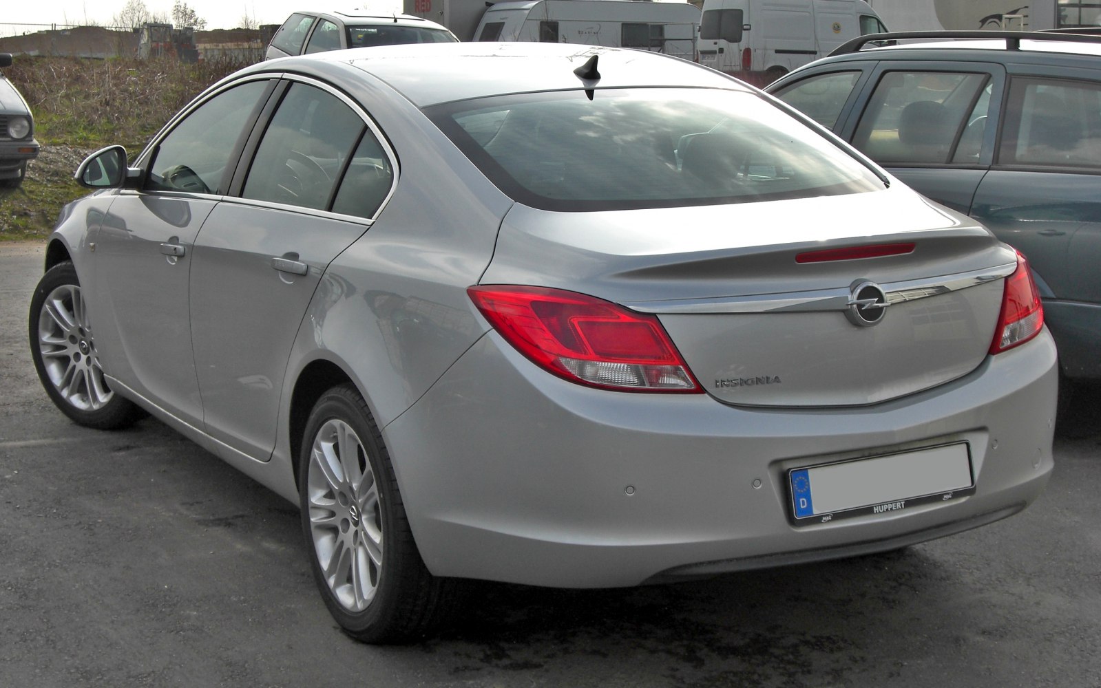 Rear view featuring tail lights and trunk of a modern sedan