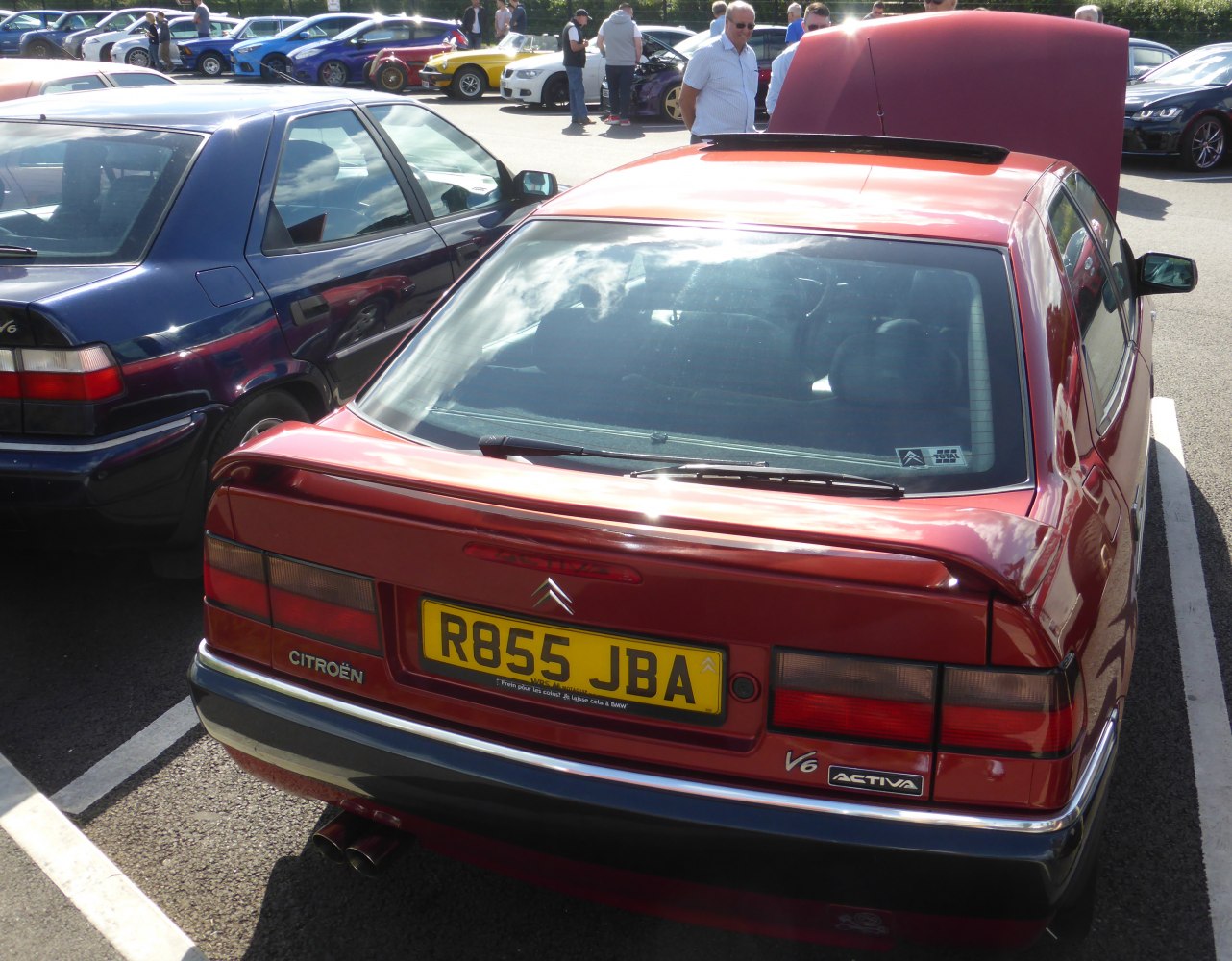 Rear view with V6 Activa badge and tail lights