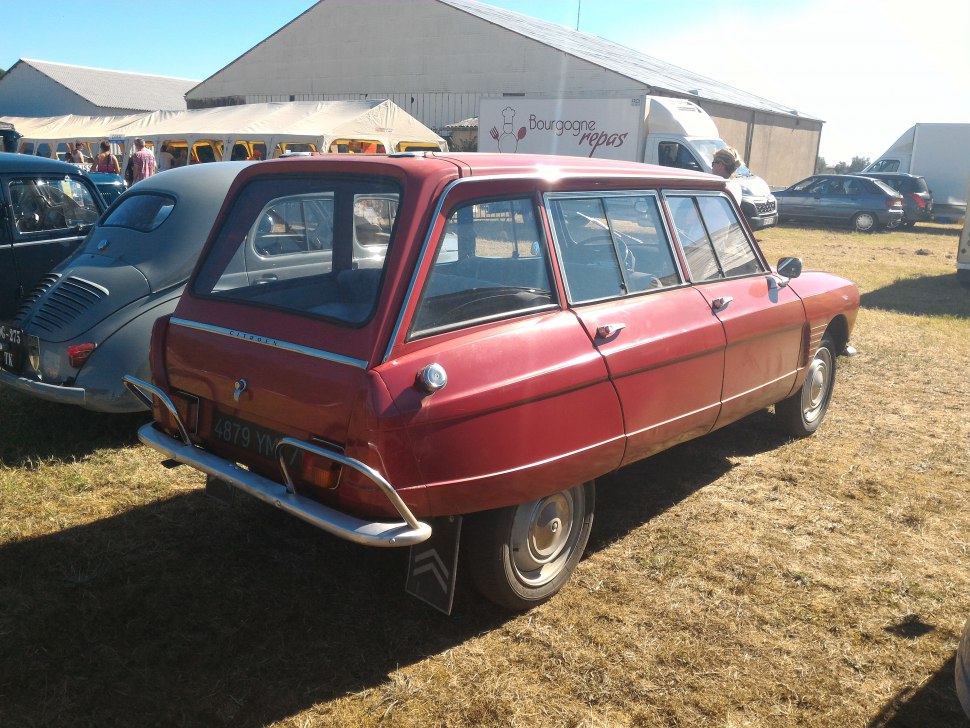 Vintage station wagon with distinctive rear design and multiple side windows