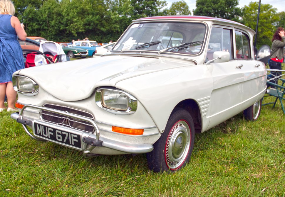 Distinctive front grille and unique headlights design on classic vintage car.