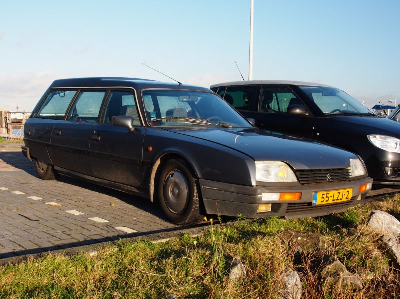Aerodynamic vintage station wagon with long roofline and panel windows