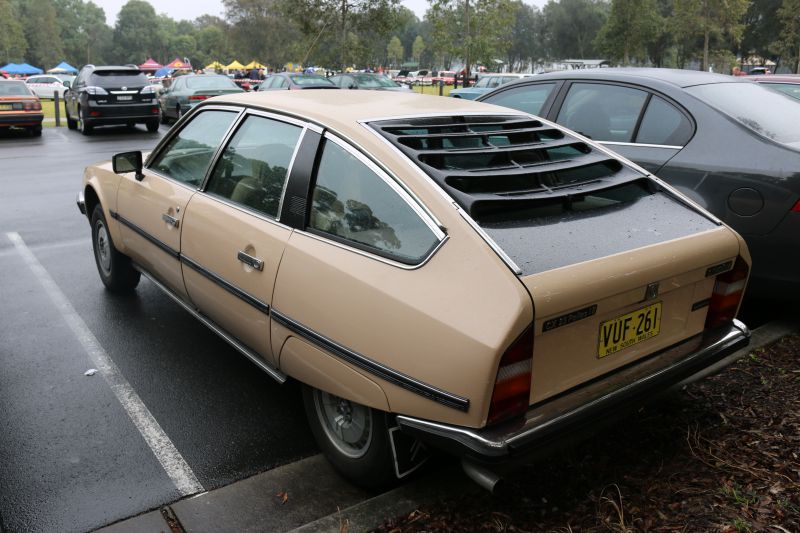 Rear view with louvered hatch and aerodynamic fastback design