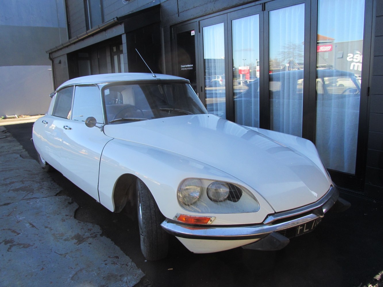 Front view with distinctive headlights and sleek body design