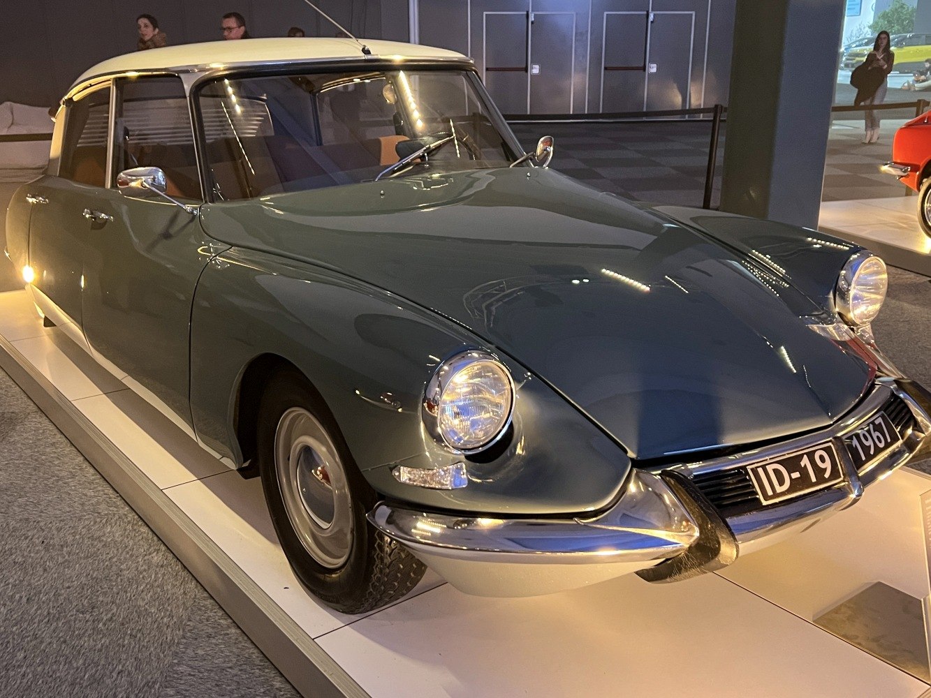 Round headlights and smooth curved front fenders