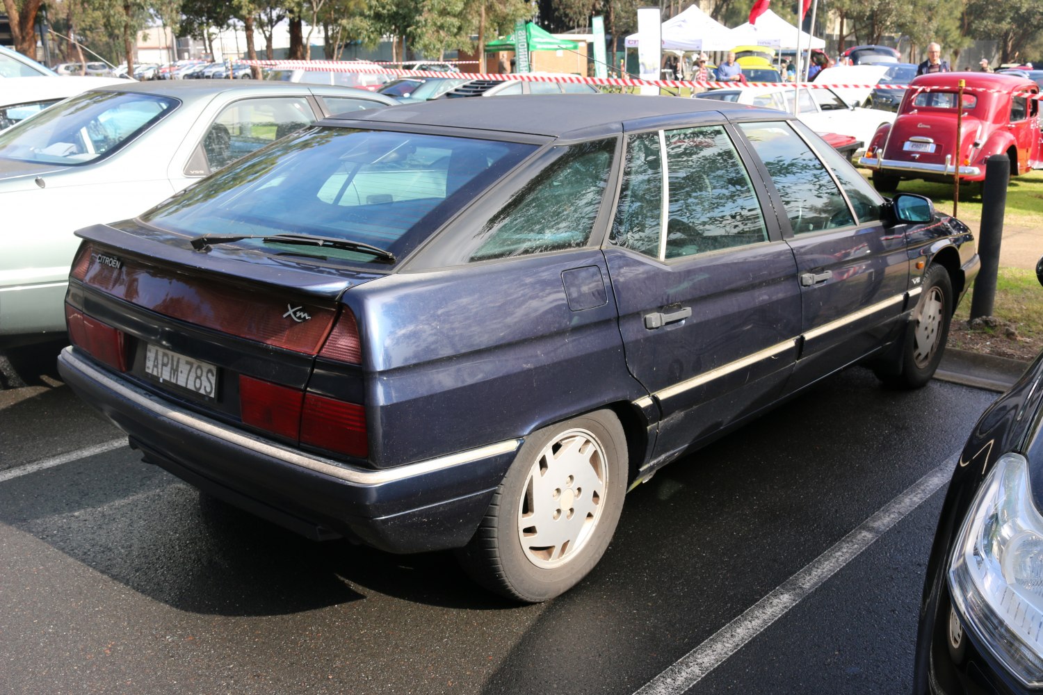 1990s hatchback with angular rear design and distinct tail lights.