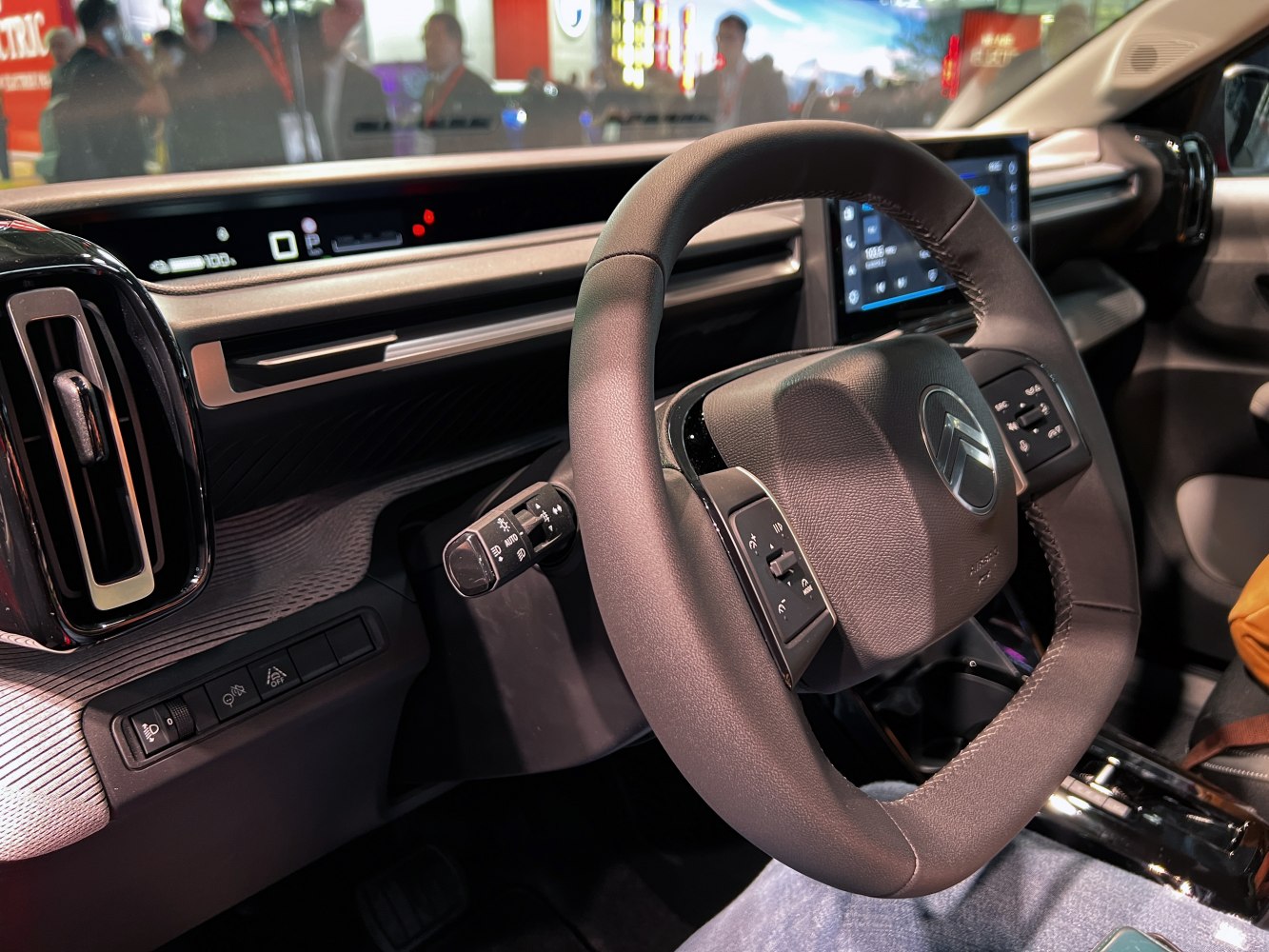 Steering wheel with controls and digital dashboard display