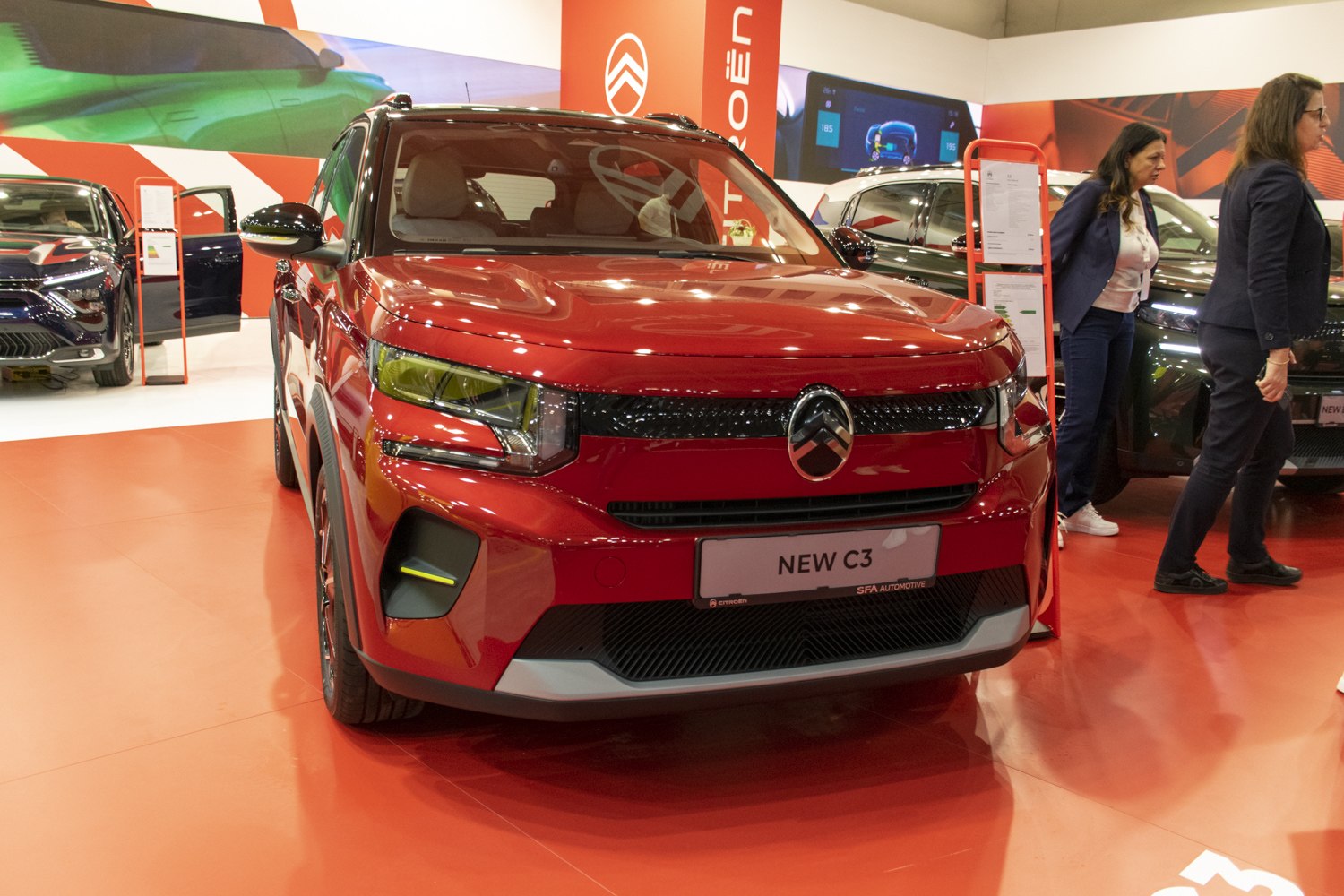 Front view of a vehicle with modern LED headlights and bold grille