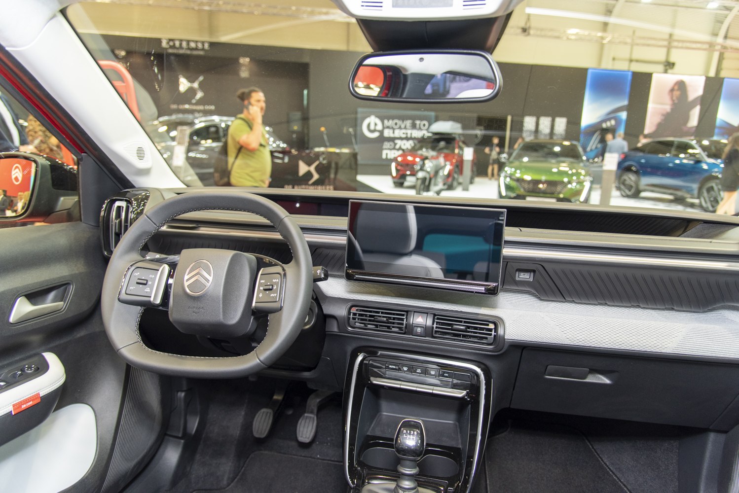 Modern digital dashboard with touchscreen and multifunction steering wheel