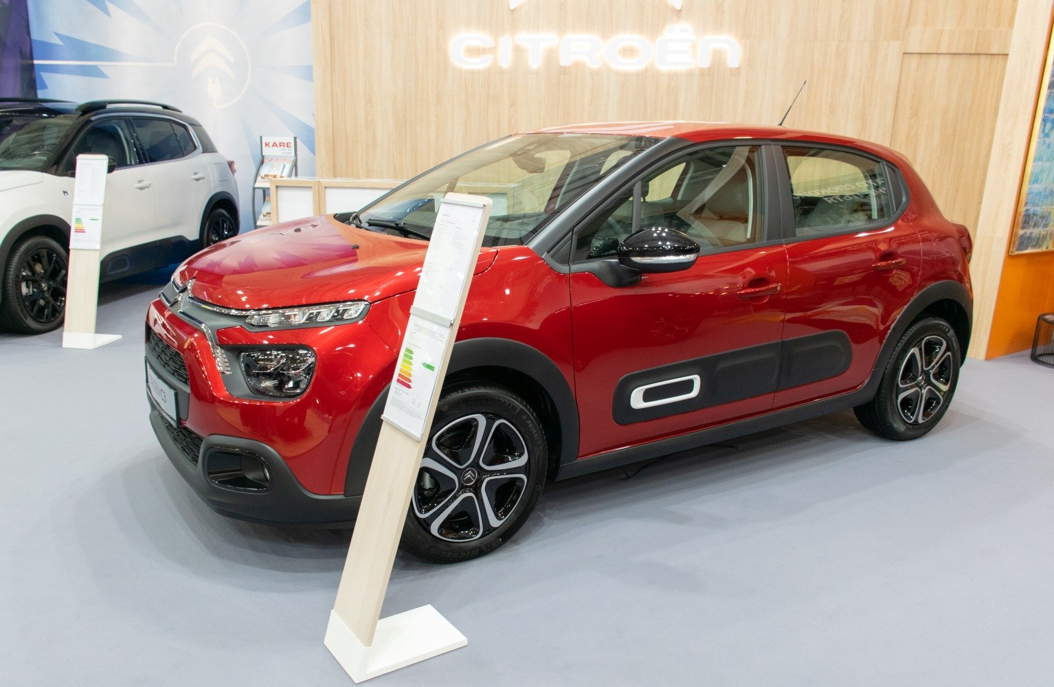 Red compact hatchback with unique side cladding and LED headlights