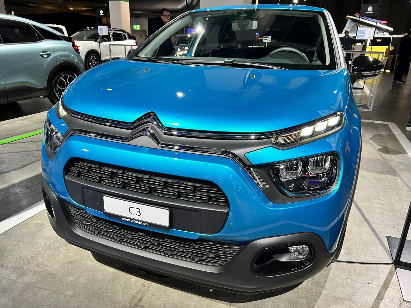 Close-up of front grille and LED headlights