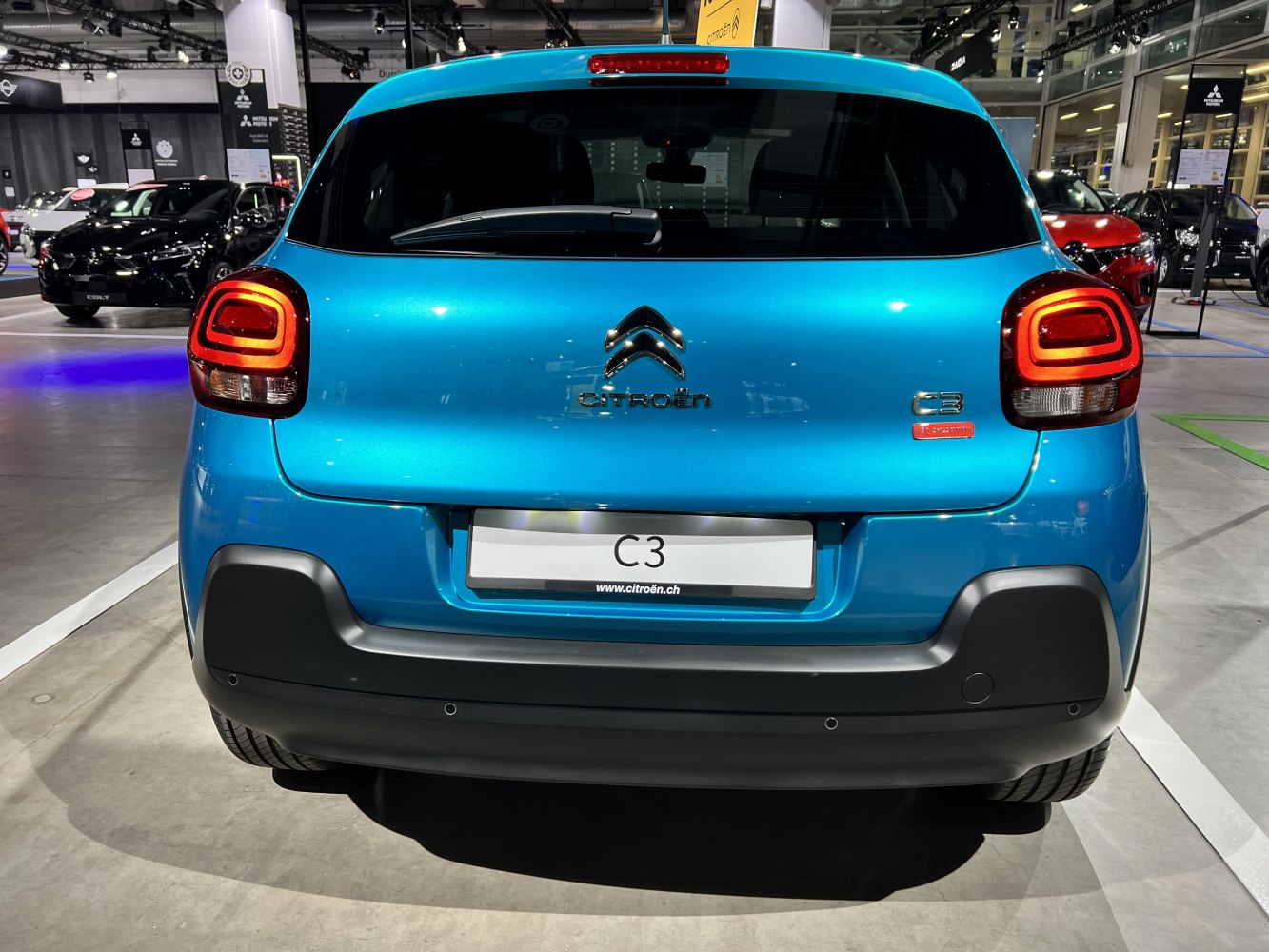 Rear design with distinctive taillights and black bumper in modern hatchback.