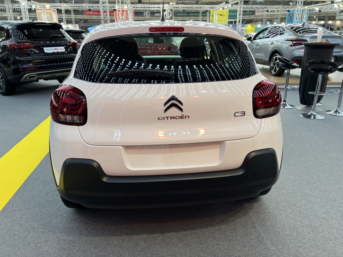 Rear hatchback view with distinctive taillights and bumper