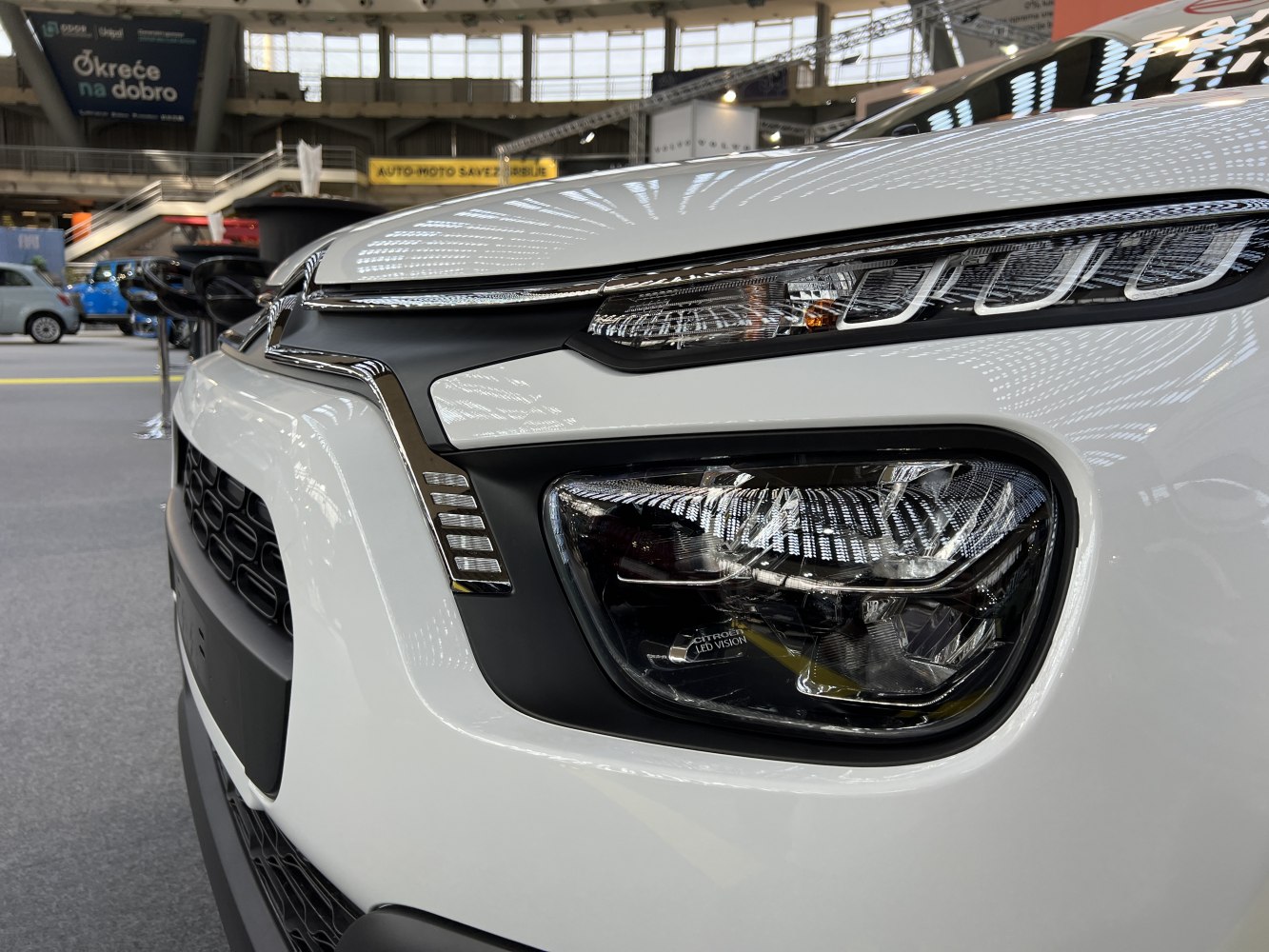 LED headlights and front grille close-up