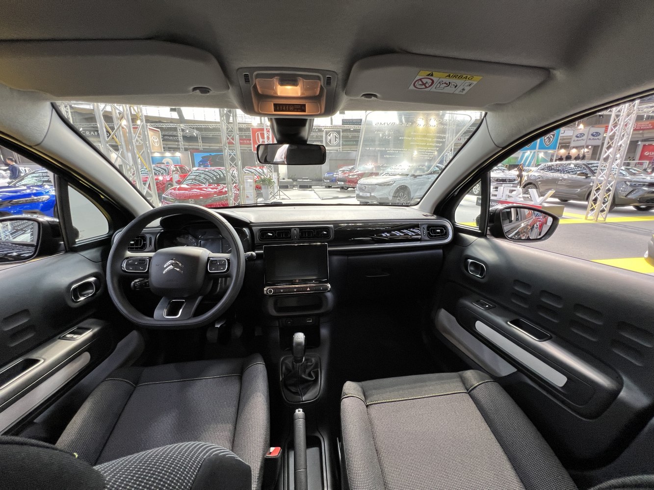 Dashboard and steering wheel with modern layout and controls