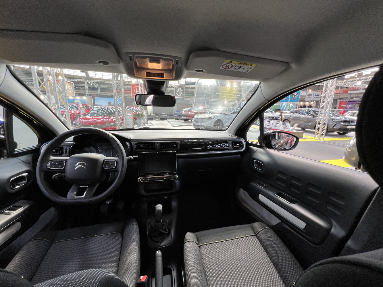 Modern interior with dashboard and front seats view