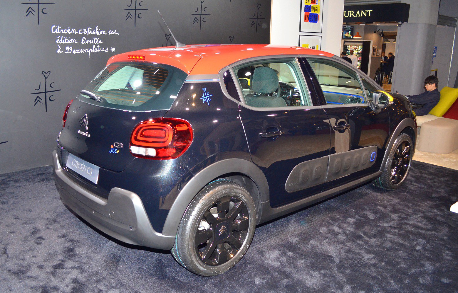 Rear LED lights and side airbump protective panels on compact hatchback