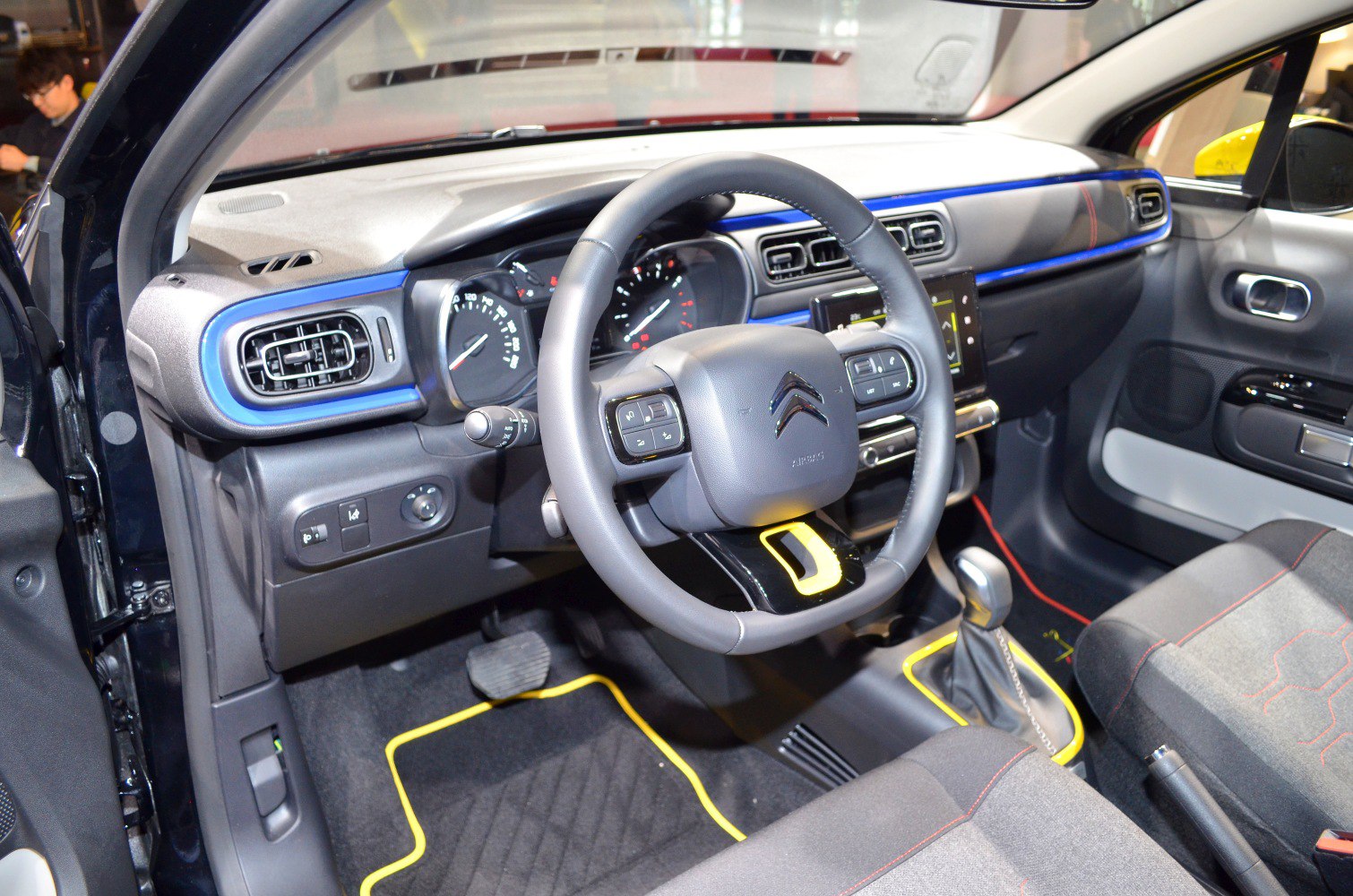 Modern dashboard and multifunction steering wheel with unique design accents