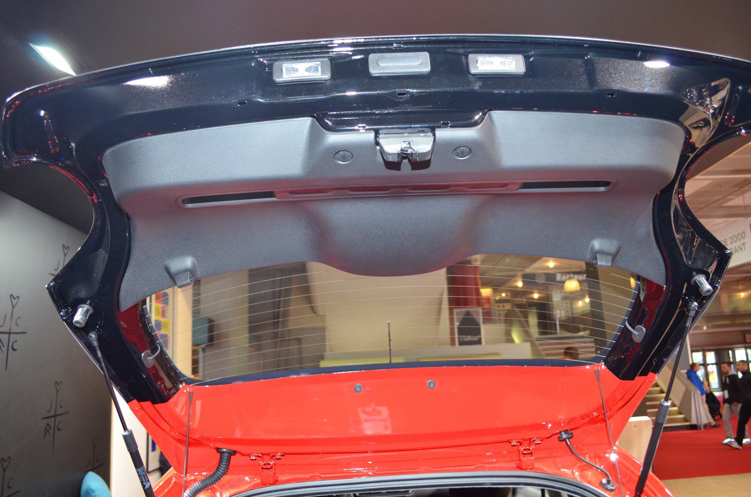 Rear hatch interior view showing trunk lid and mechanism.