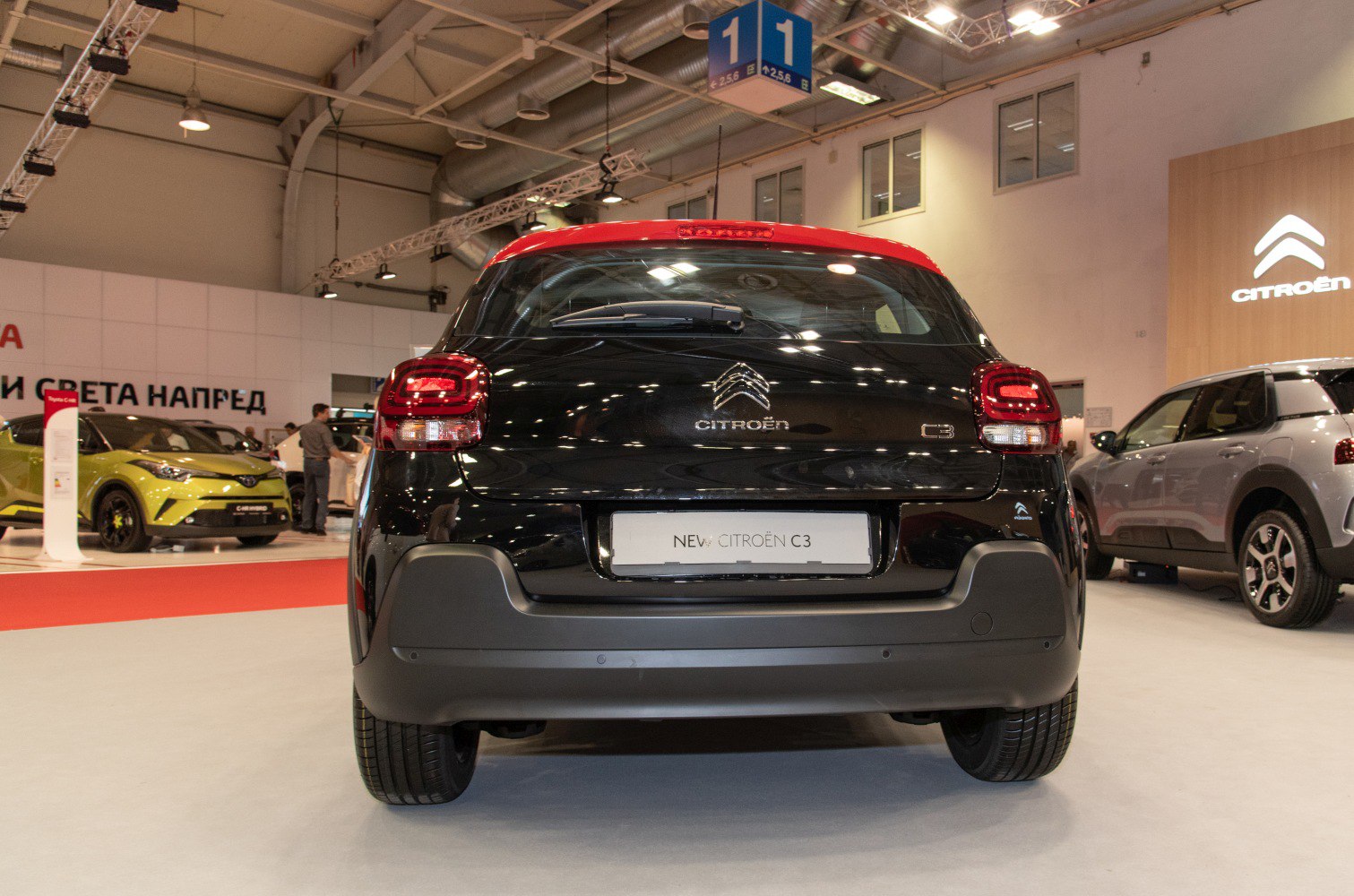 Rear view of compact hatchback with distinctive taillights