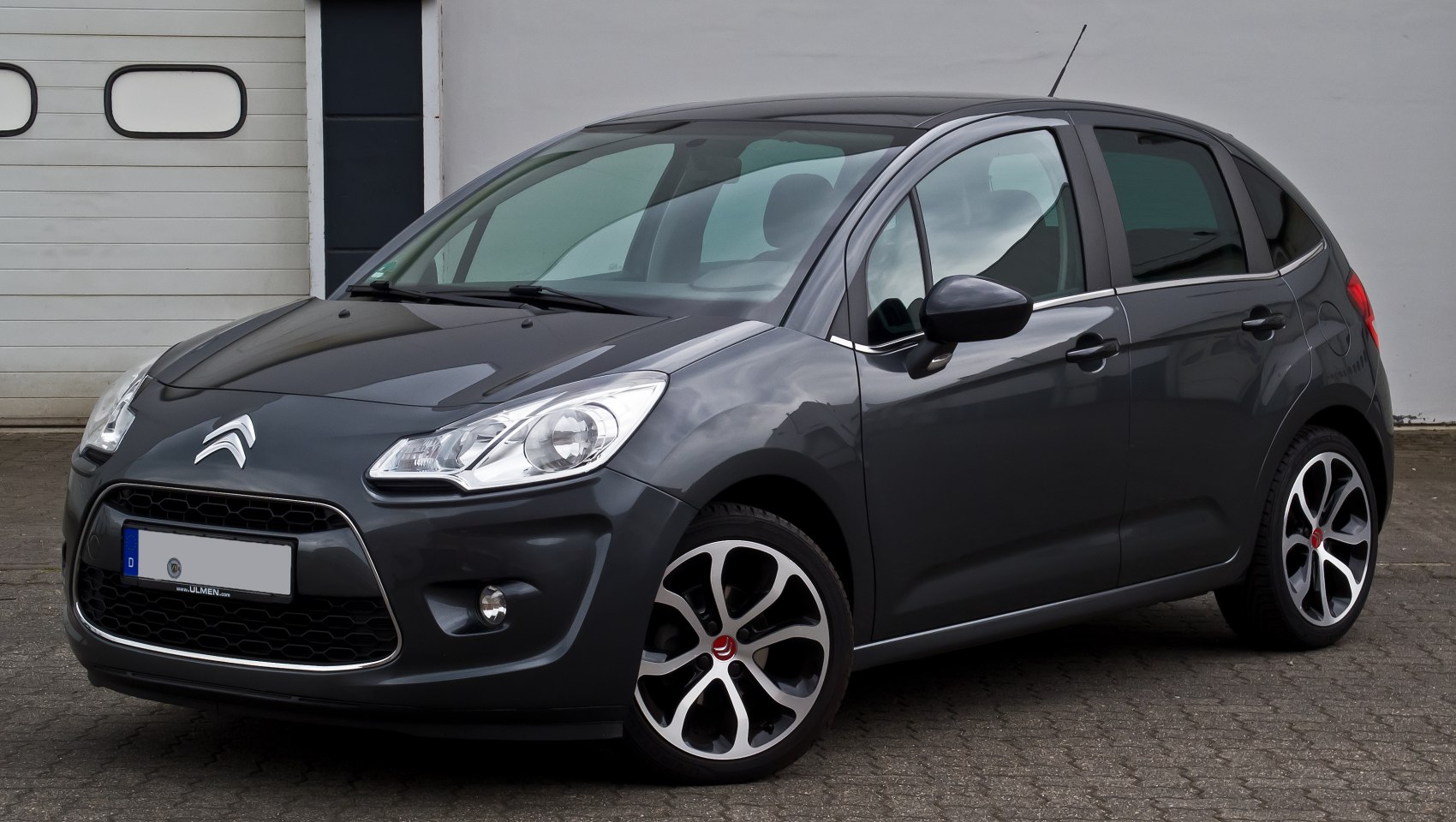 Front-side view of a compact hatchback with alloy wheels