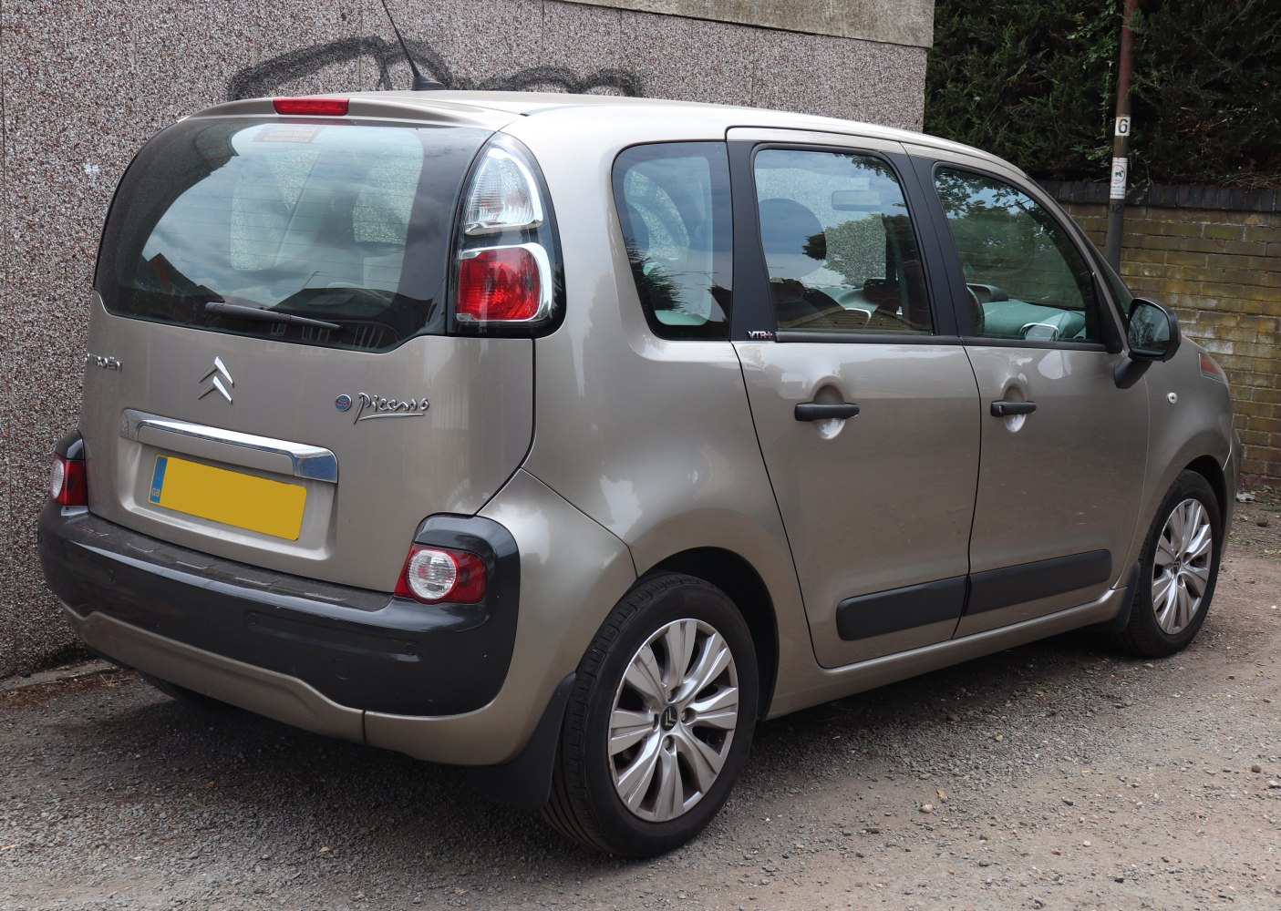 Rear side profile with taillights and side door details