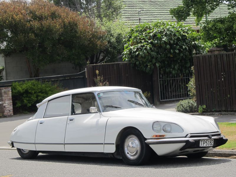 Classic vintage luxury sedan with aerodynamic body and iconic design