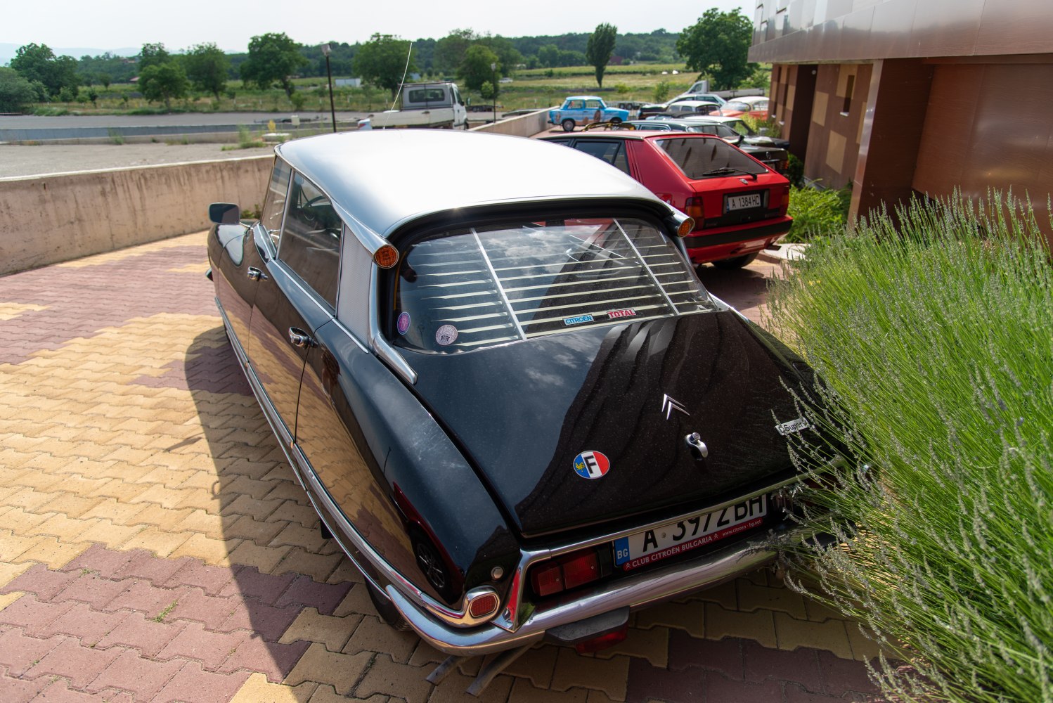 Distinctive rear design with chrome trim and rear window louvers