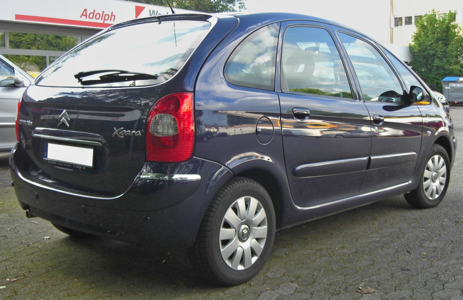 Rear side view with taillights and alloy wheels