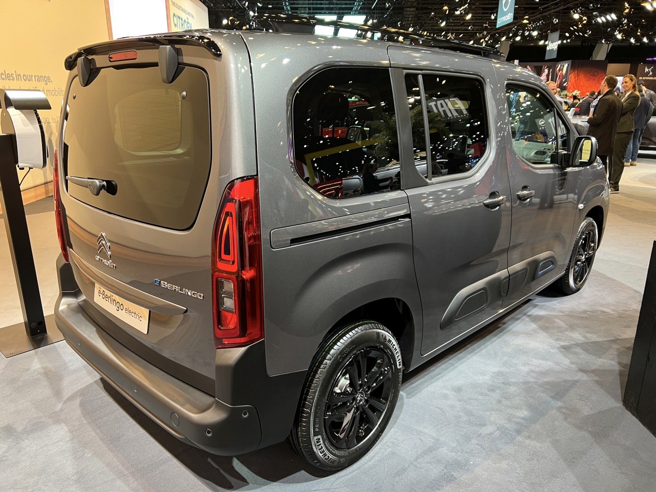 Rear side view of electric compact van with tinted windows and black alloy wheels
