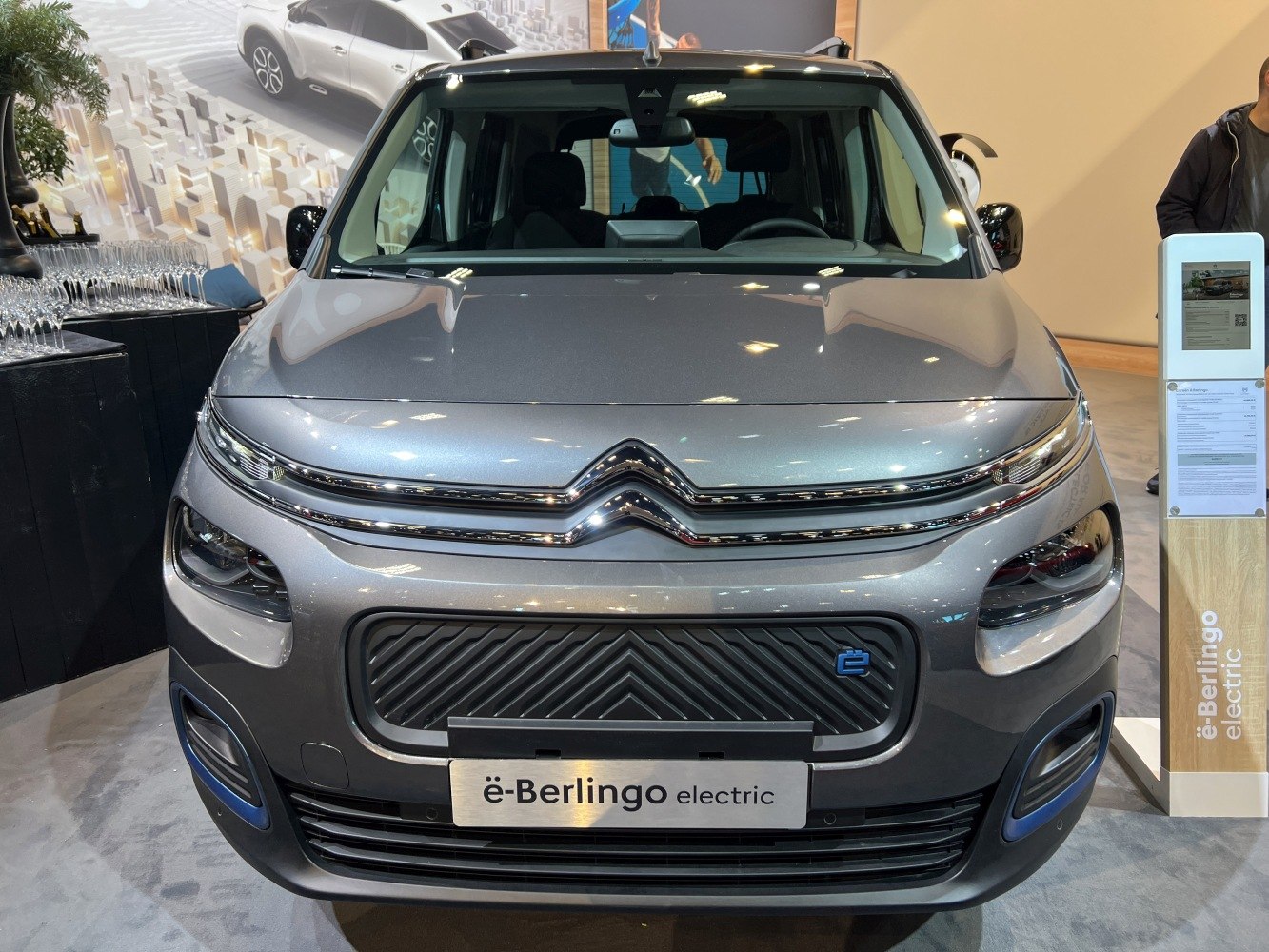 Front view with grille, headlights, and electric badge