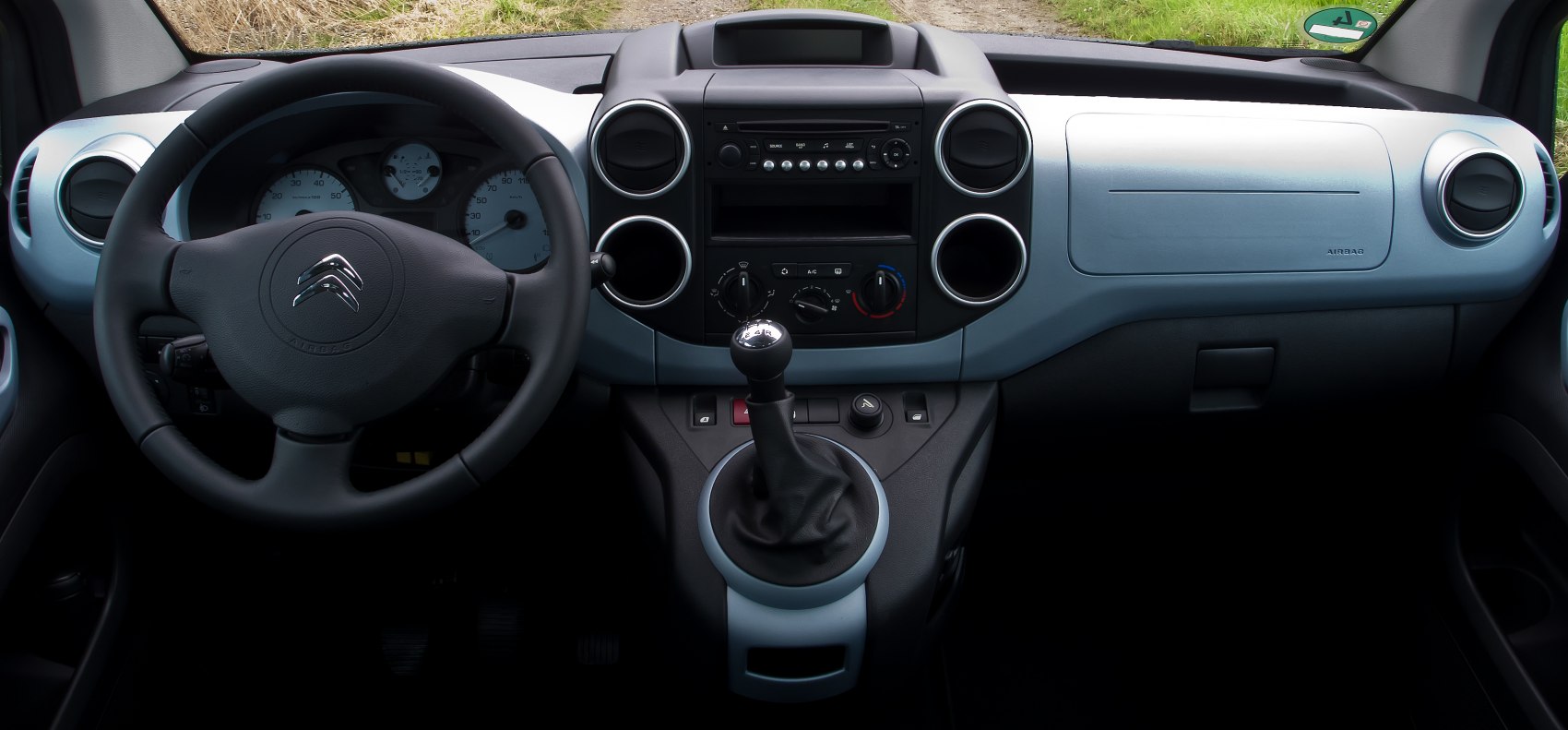 Dashboard and manual gear shift in car interior