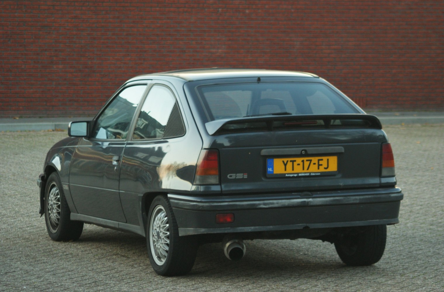 Rear view hatchback with spoiler and alloy wheels