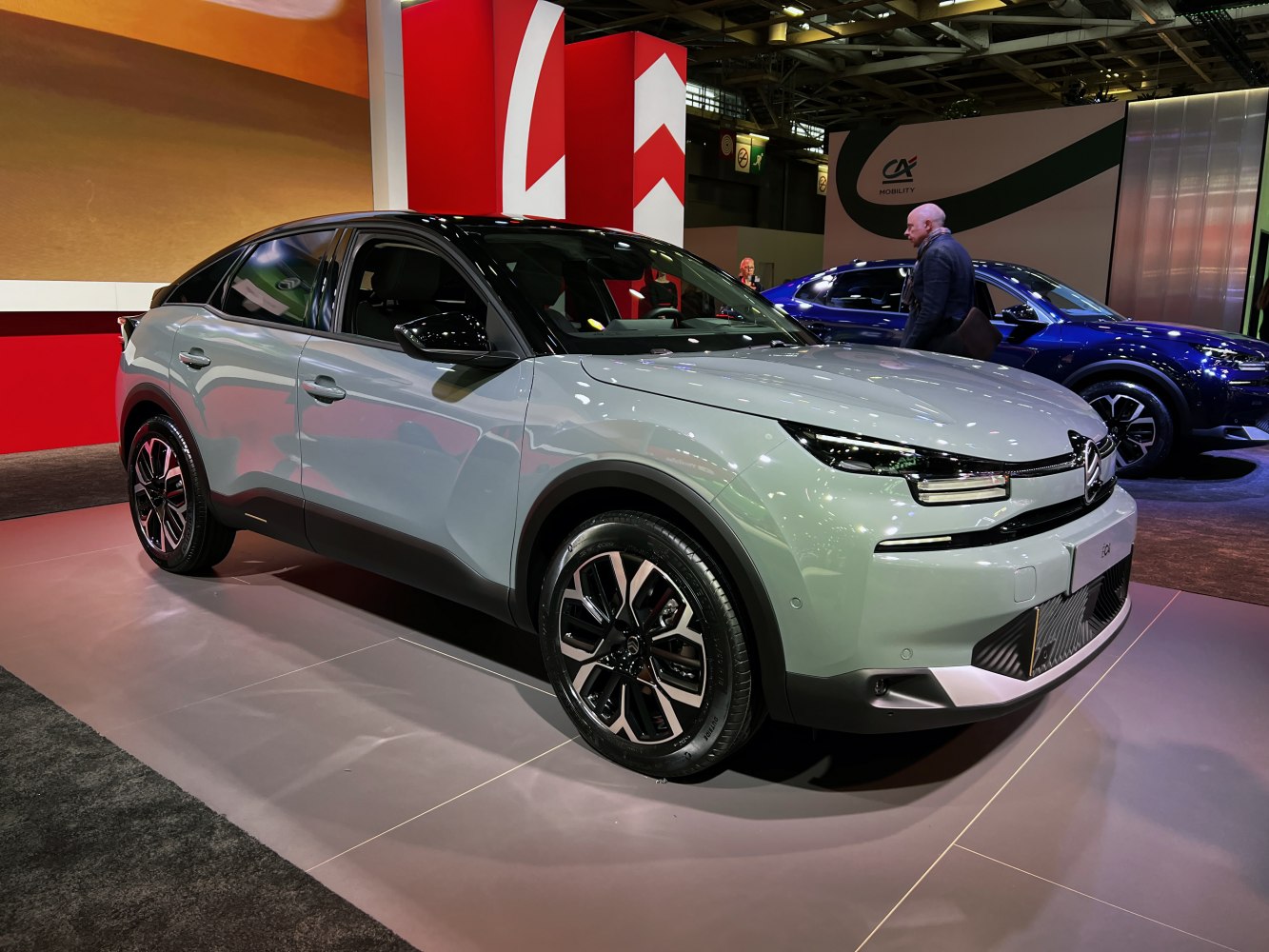 Modern crossover with split LED headlights and black roof