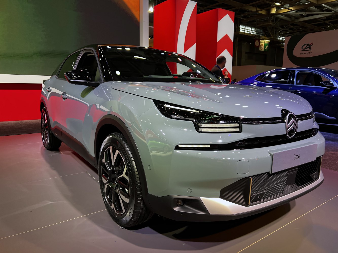 Modern car front with distinctive LED headlights and black roof