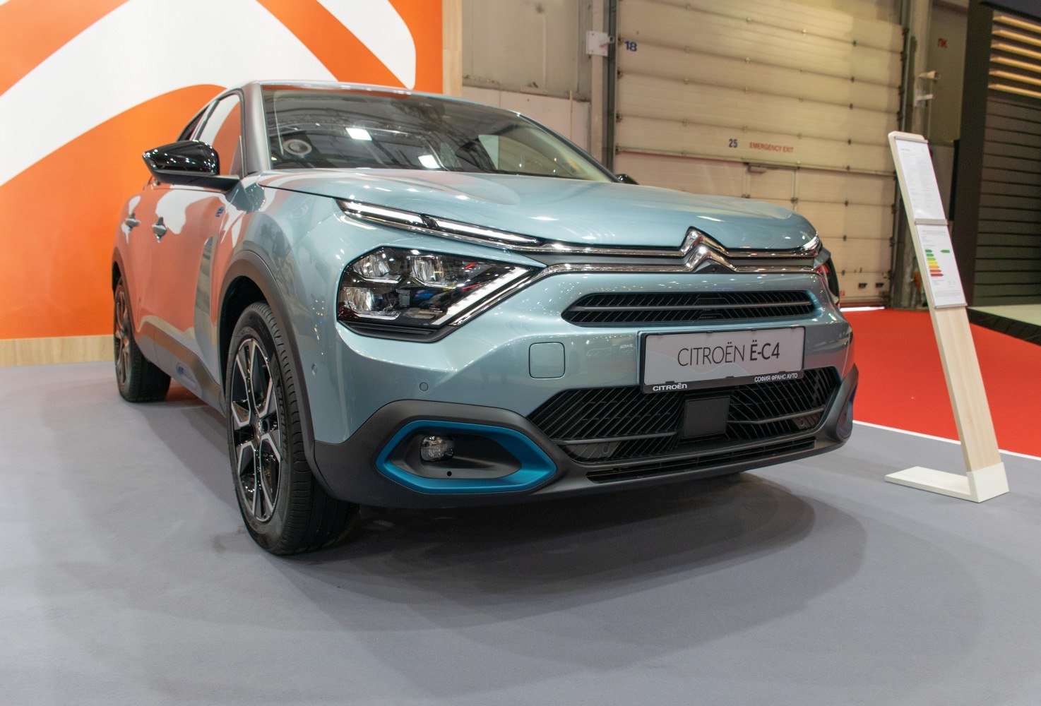 Front view with distinctive headlights and grille design