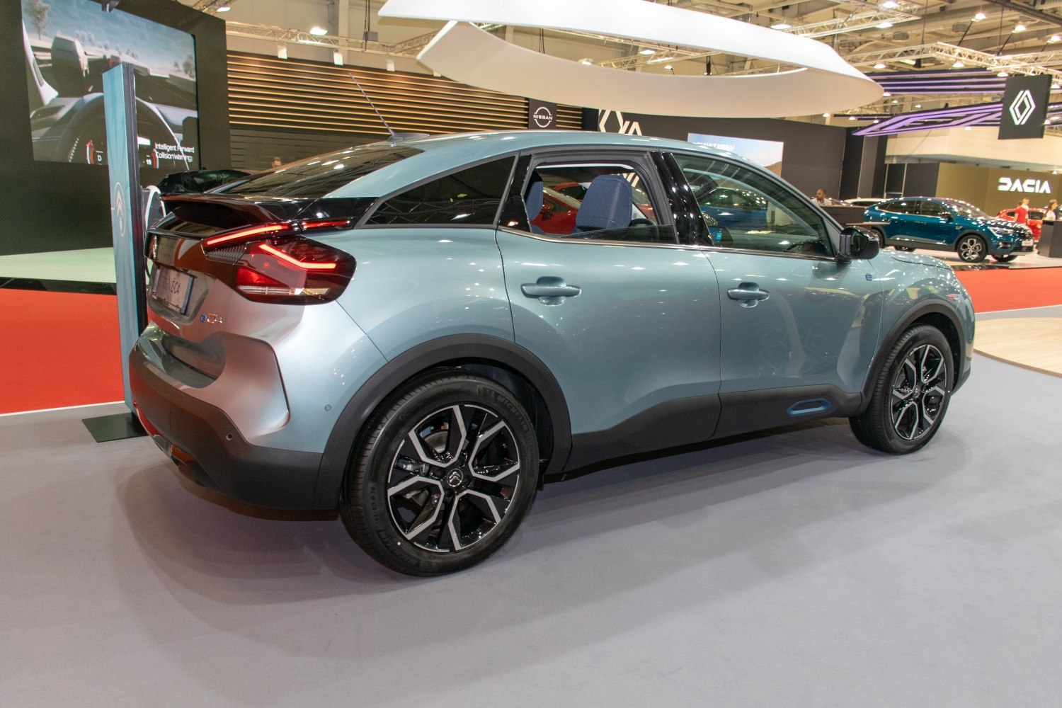 Modern crossover rear-side with distinctive taillights and sporty alloy wheels