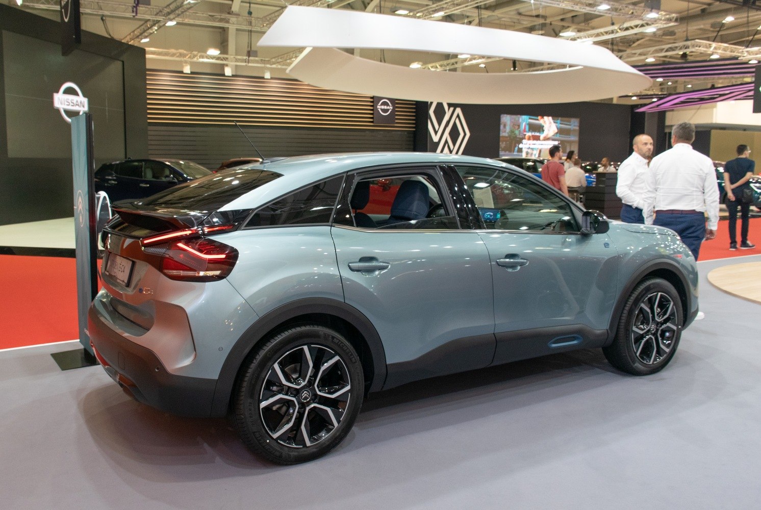 Sleek crossover SUV rear side with LED tail lights and alloy wheels