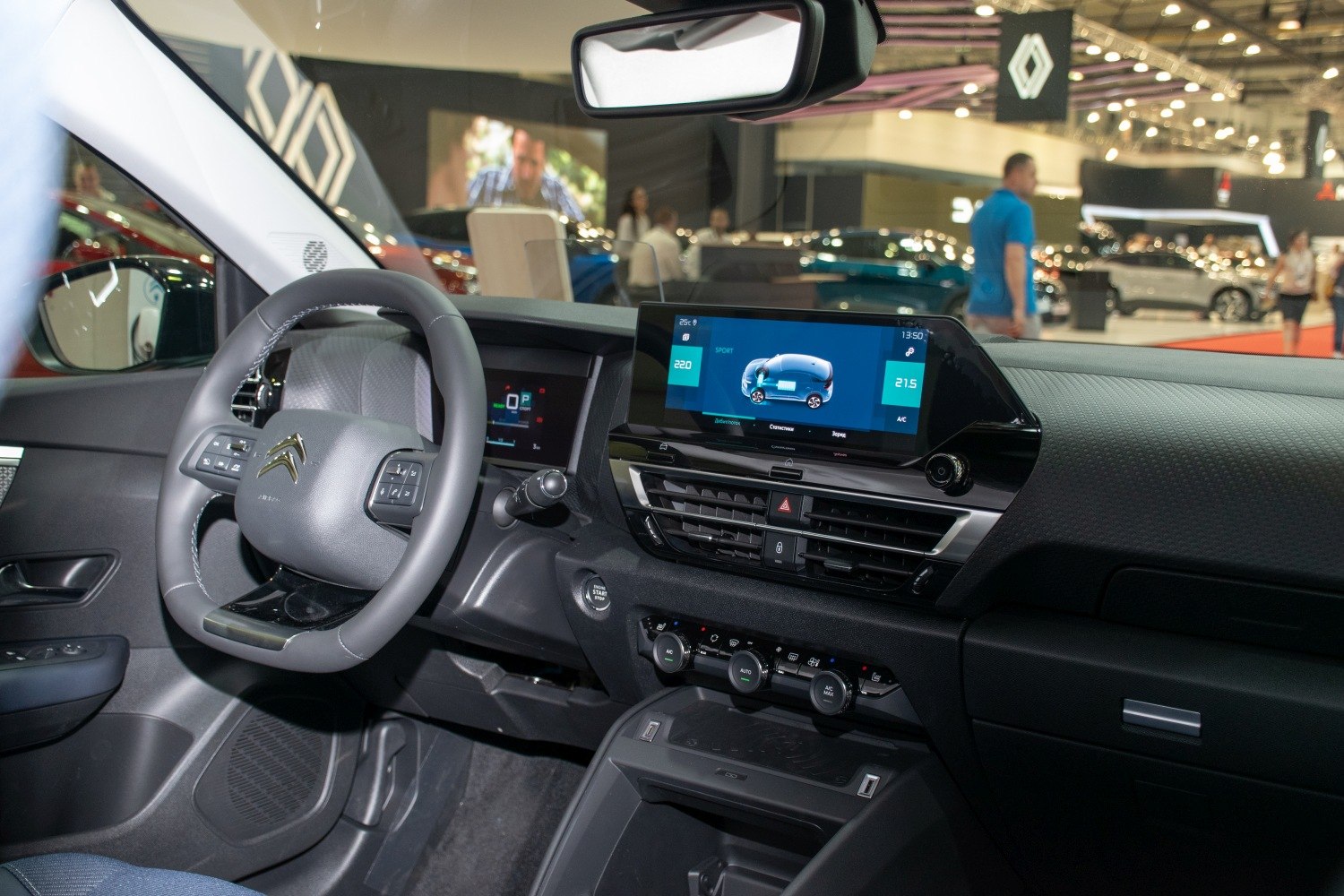 Digital instrument cluster and touchscreen dashboard of a modern vehicle interior