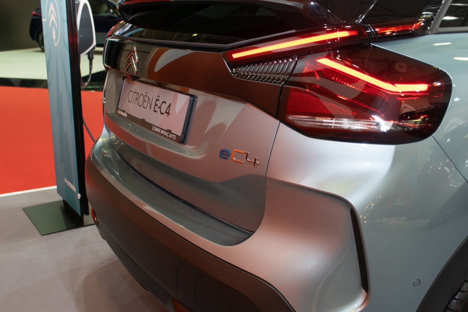 Rear LED taillights and electric e-C4 badge on a modern hatchback