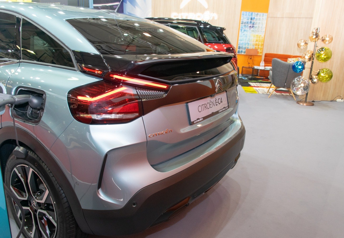 Rear taillight design and electric charging port of a compact electric vehicle