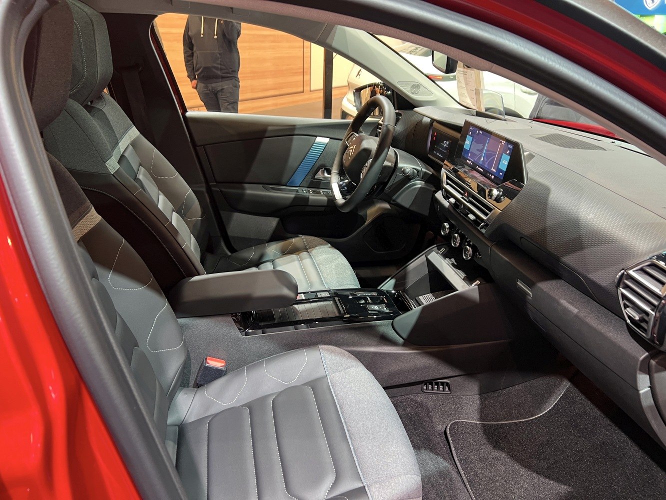 Modern car interior with digital dashboard and ergonomic seats