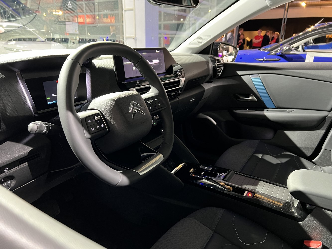 Modern interior dashboard with multifunction steering wheel and digital displays