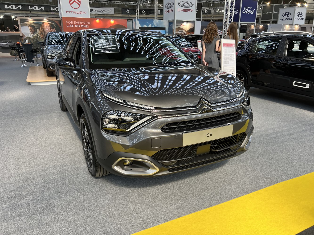Close-up of modern SUV front with LED headlights and grille design